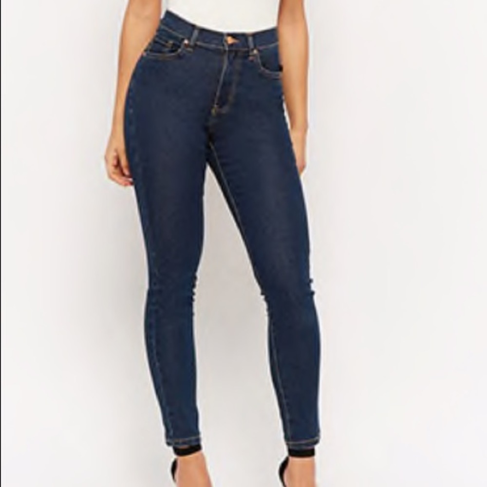 High waisted dark blue jeans